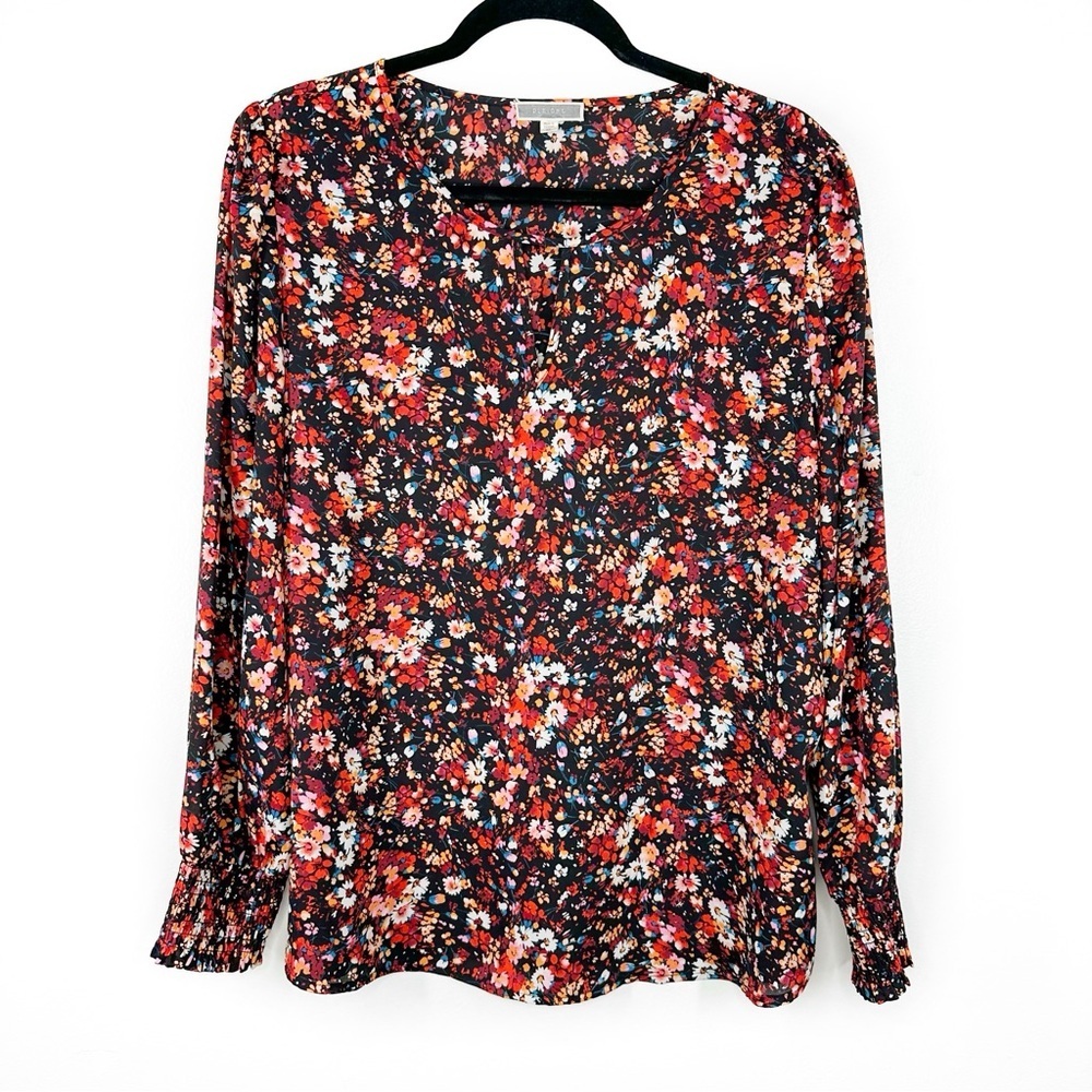 Pleione triangle cutout floral blouse